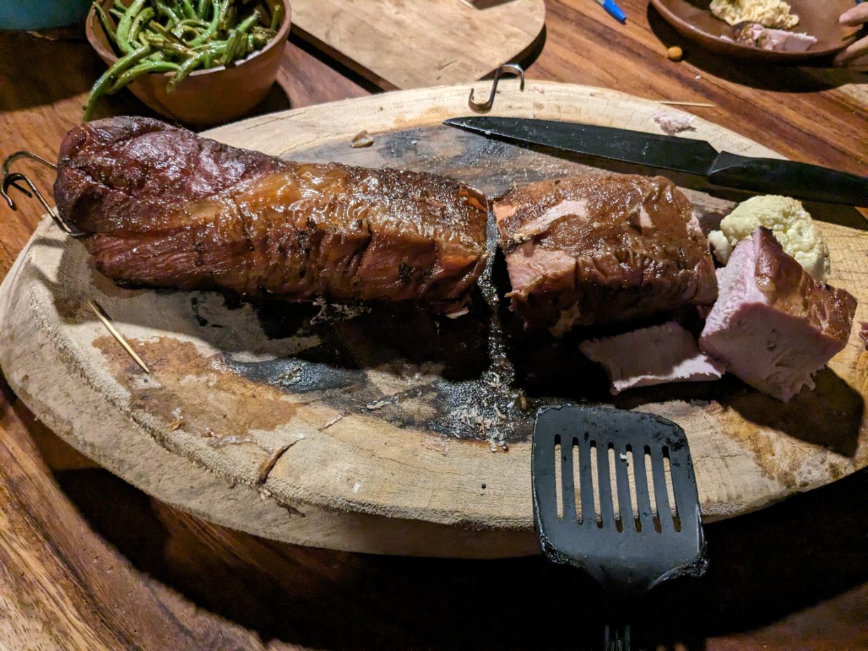 Smoked dinner served on a wooden table